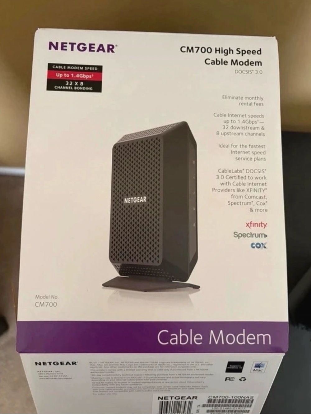NETGEAR Black and Purple CM700 Cable Modem Box
